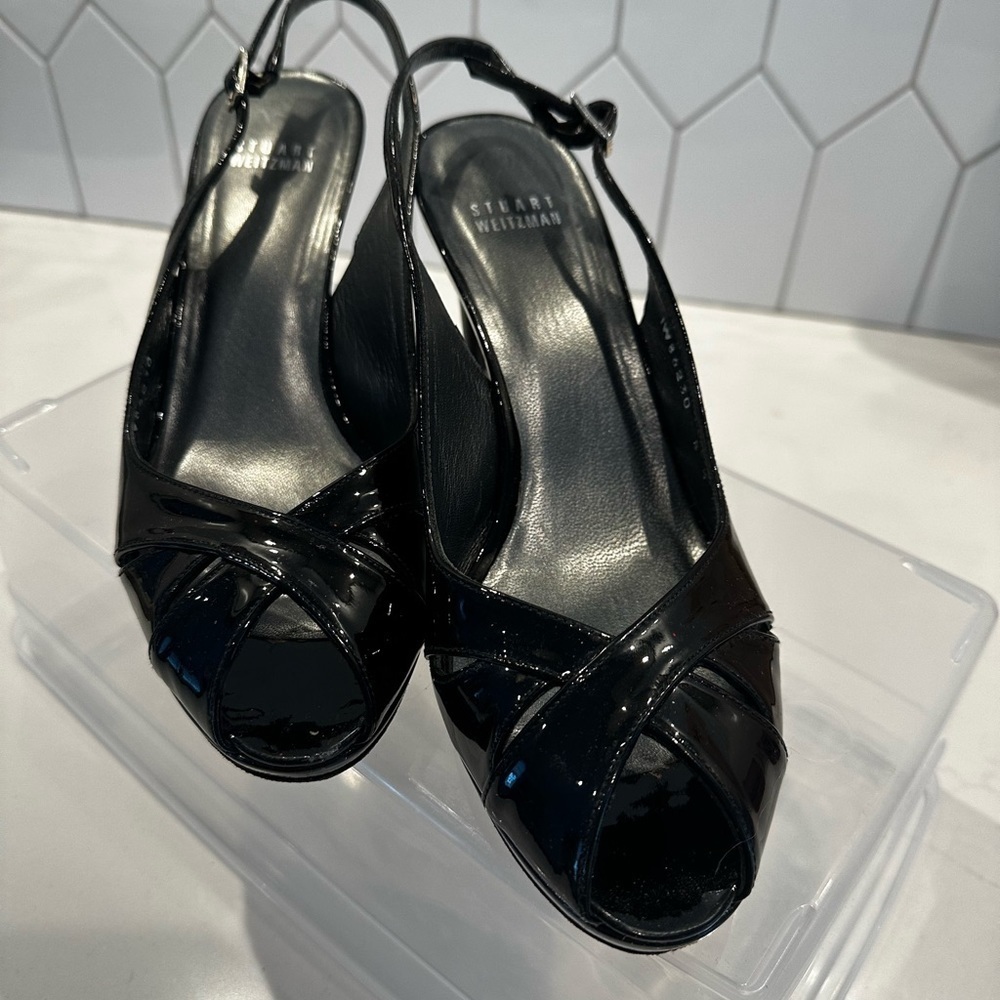Stuart Weitzman Peekapoo Black Patent 3” Heels Sling back and peekaboo toe.